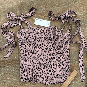 Brand new with tags. Reformation cheetah print shoulder tie pink panther top.